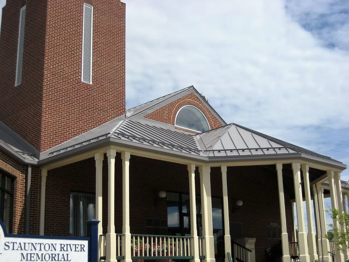 Skilled roofing craftsmen working on a residential roof in Mount Gilead